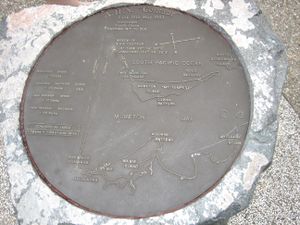 A large, circular plaque mounted in a stone. The plaque shows where Centaur is believed to have sunk, and where the survivors were found, in relation to the local geography