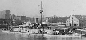 The USS Amphitrite moored at the Boston Navy Yard.