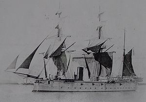 HMS Dryad at anchor, with sails airing